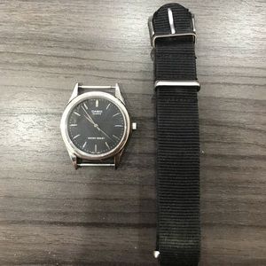 Casio watch with black band and black dail